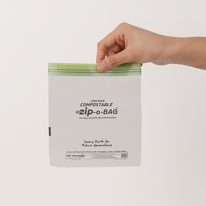 Compostable zipper bags — reusable-style with secure zip-lock closure for food storage, retail packaging, and consumer use.
